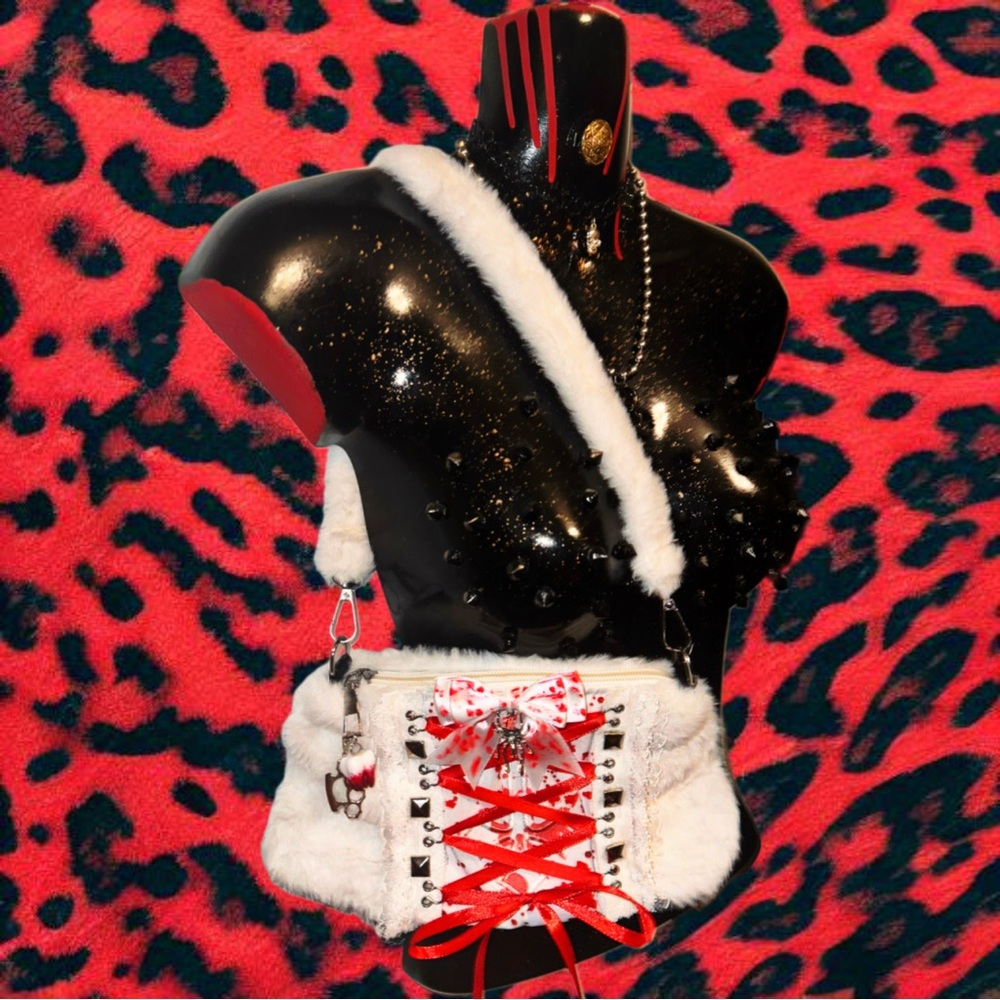 Bloody white fur corset bag with studs